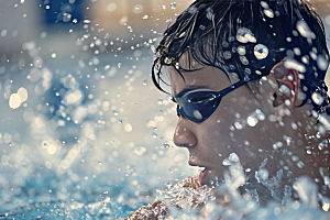 游泳运动员比赛泳道摄影图