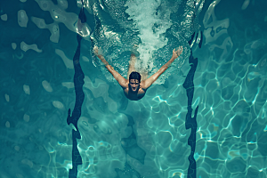 游泳运动员泳池竞技摄影图