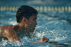 游泳比赛泳道游泳运动员摄影图