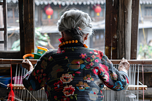 母亲织毛衣慈母手中线高清摄影图
