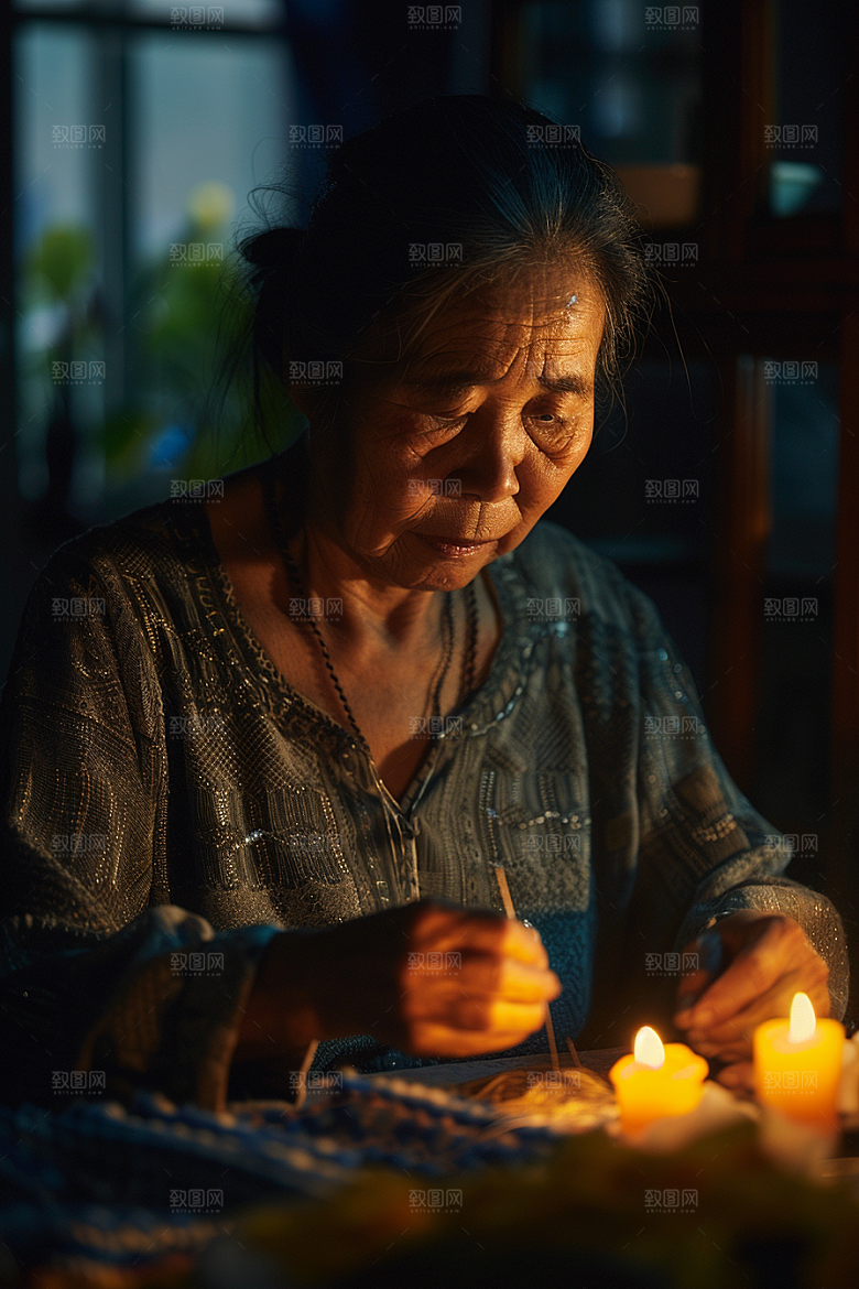 母亲织毛衣期望老人摄影图